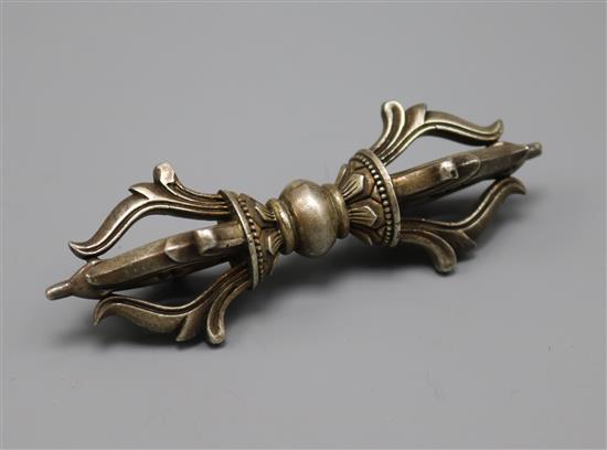 A white metal vajra